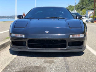 Illustration for article titled Why buy a C8 when you could buy this old, high-mileage, manual, mid-engined Honda for less instead?